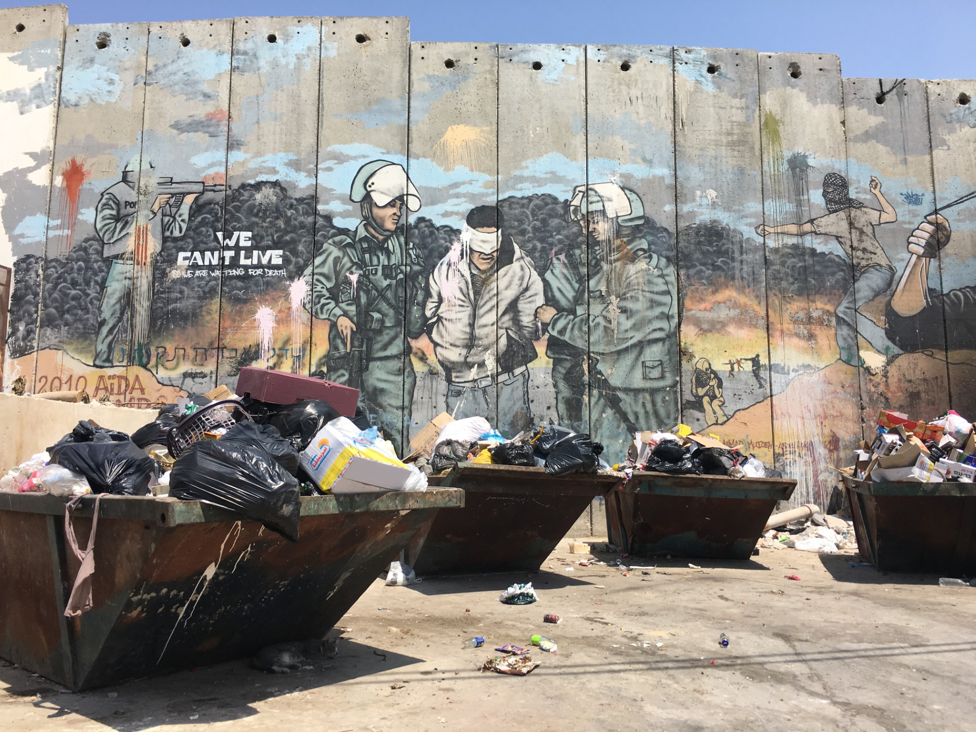 Mural dated 2010 in the Aida refugee camp just outside Bethlehem: “WE CAN’T LIVE. So We Are Waiting For Death.” 