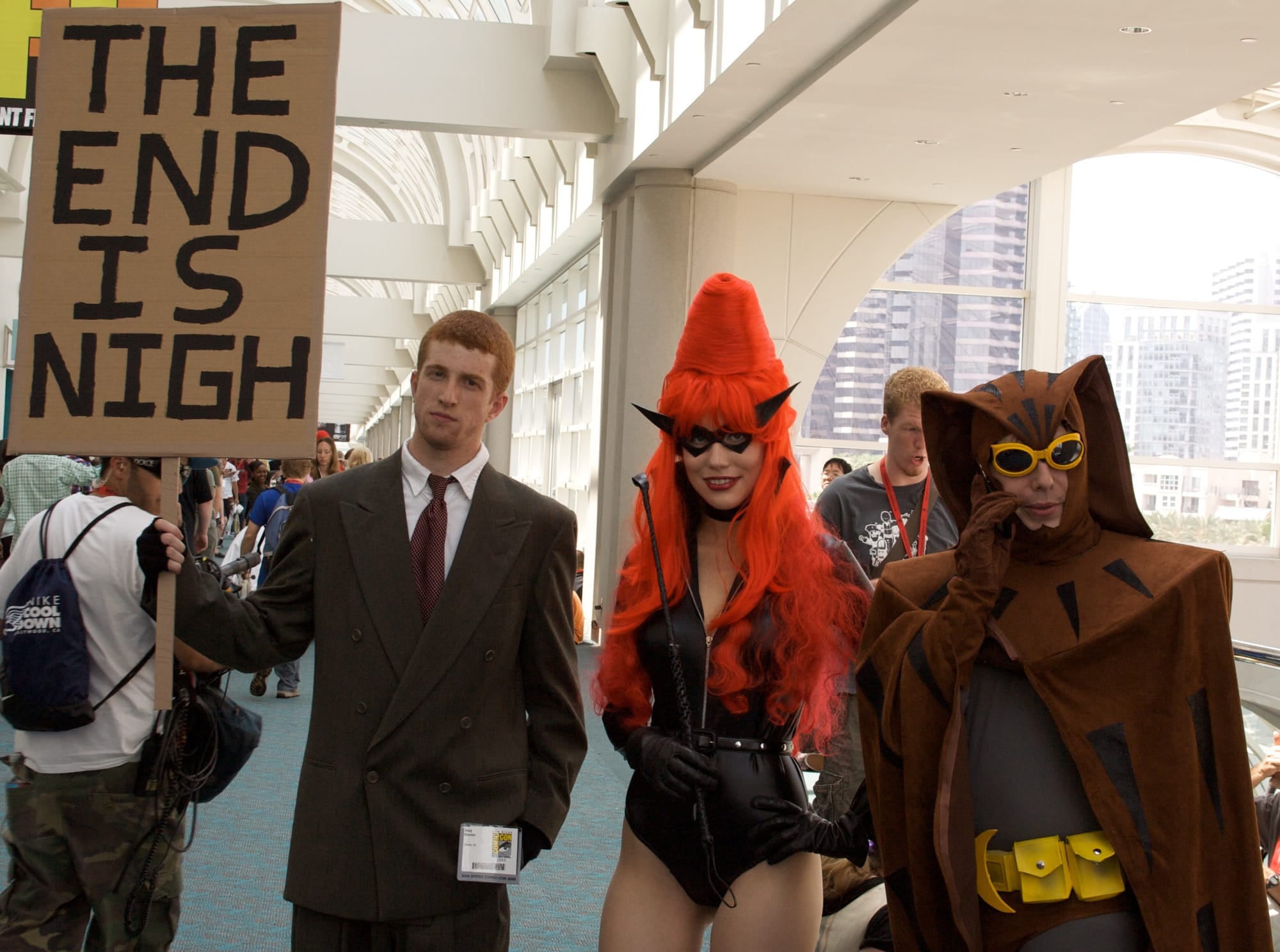 Exquisitely accurate, colorful Rorschach, Twilight Lady and Nite Owl cosplayers posing in at at Comic-Con 2009
