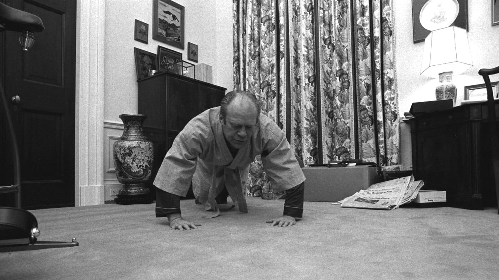President Gerald R. Ford exercising in his dressing gown and jim-jams