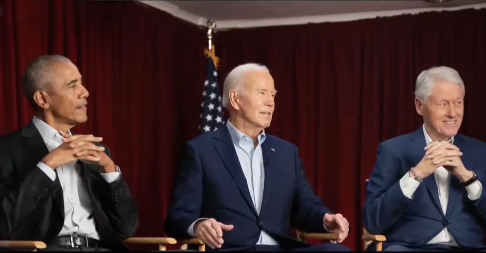 Presidents Obama, Biden and Clinton meet before a fundraiser at Radio City Music Hall; all are seated, in dark jackets and shirts unbuttoned at the throat.