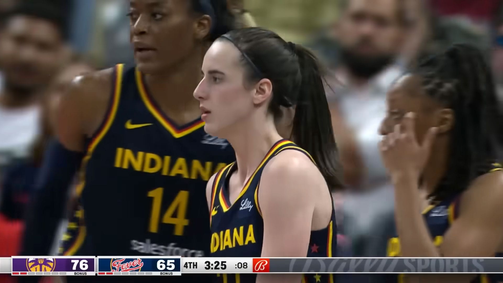 Screenshot: Caitlin Clark with teammates Kelsey Mitchell and Temi Fagbenle in a May 2024 game against the Seattle Storm