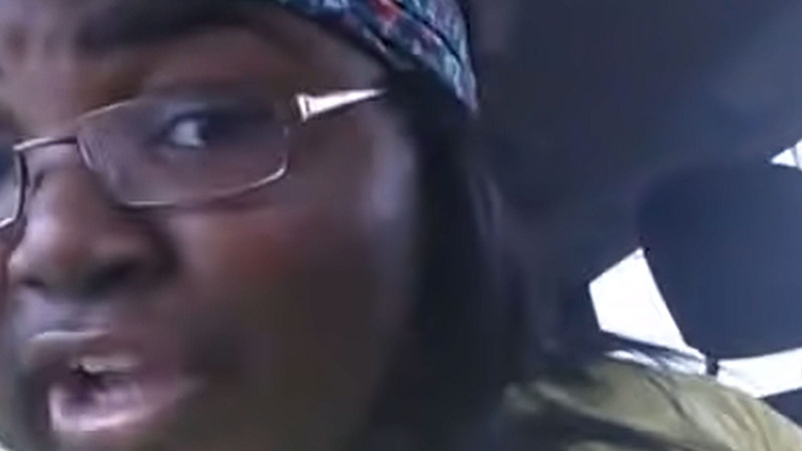 Kayla Newman's original "on fleek" selfie video, taken inside a car; she wears glasses and a printed headband