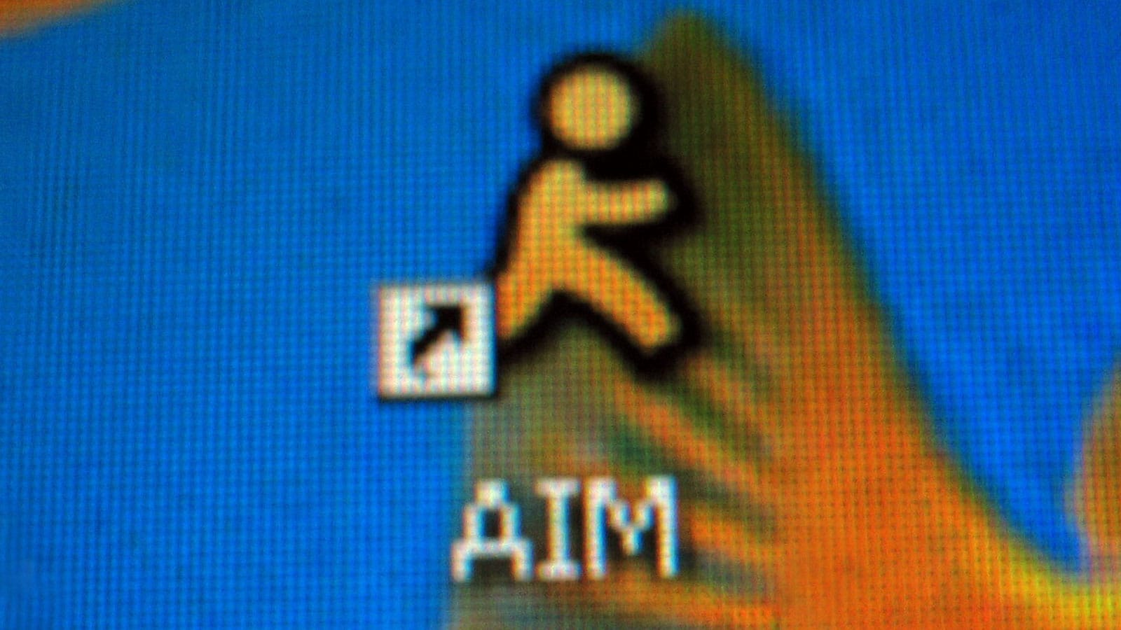 Blowup of a computer screen with the familiar AOL Instant Messenger icon and shortcut arrow on a vivid blue ground