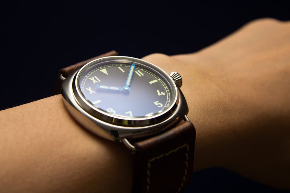 A wrist, wearing a quite nice oversized wristwatch