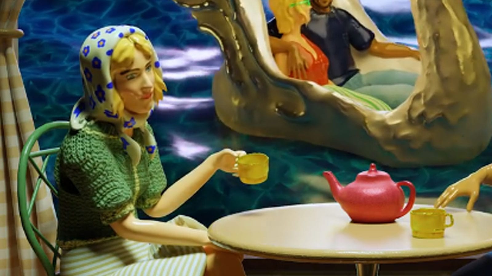 A Barbie-like plastic figure of a woman drinking tea; she wears a blank, doll-like expression, a kerchief tied around her hair and a green knitted top and striped skirt. Behind her on glistening artificial water is a different version of herself, riding in a swan boat with a man, his arm draped affectionately around her shoulders.